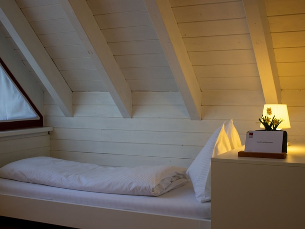 Imagen de la habitación del Hotel G&auml;stehaus Gutenberg - Self-Check-in. Foto 4