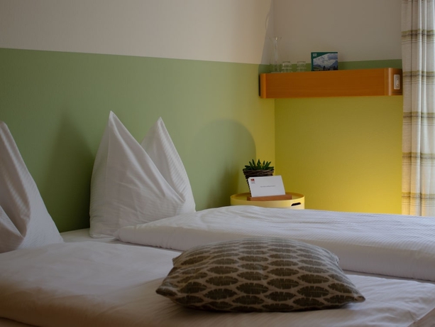 Imagen de la habitación del Hotel G&auml;stehaus Gutenberg - Self-Check-in. Foto 6