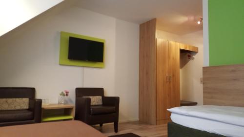 Imagen de la habitación del Hotel G&auml;stehaus Ruh, Friburgo. Foto 12