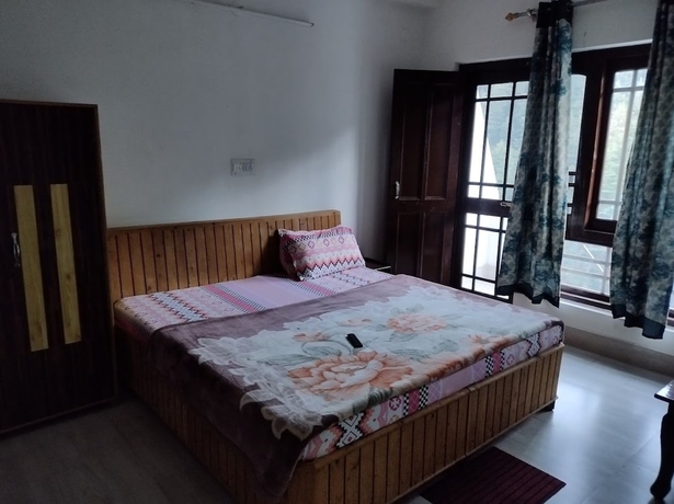 Imagen de la habitación del Hotel Gautam Khajjiar. Foto 7