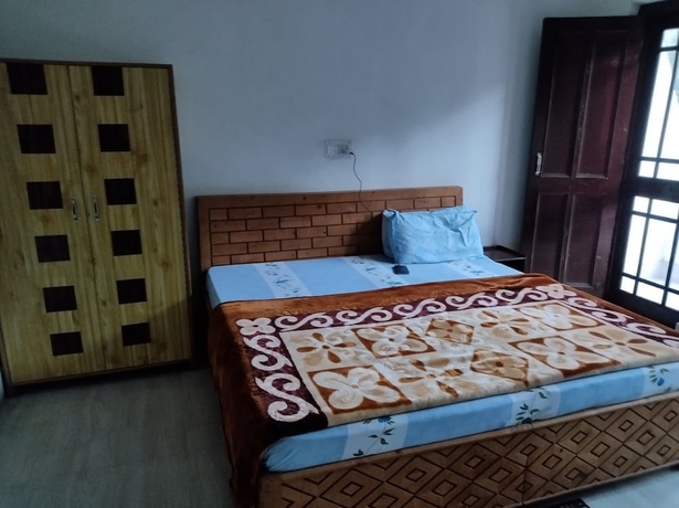 Imagen de la habitación del Hotel Gautam Khajjiar. Foto 15