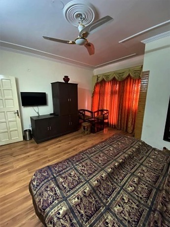 Imagen de la habitación del Hotel Gautam Residency Chamba. Foto 8