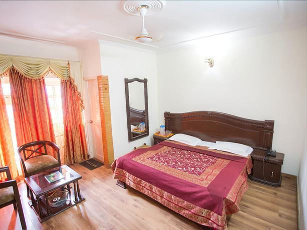 Imagen de la habitación del Hotel Gautam Residency Chamba. Foto 9