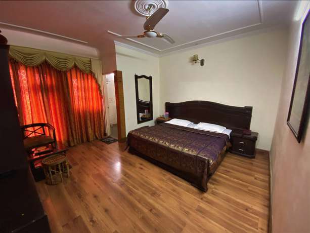 Imagen de la habitación del Hotel Gautam Residency Chamba. Foto 11