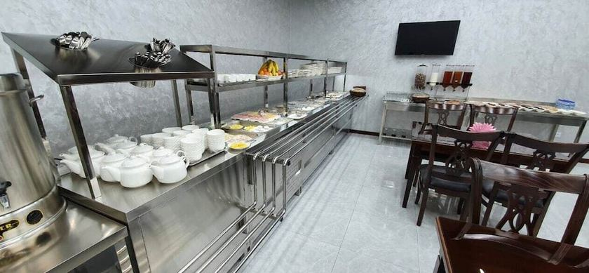 Imagen del bar/restaurante del Hotel G'ayrat Hoji Ota. Foto 3
