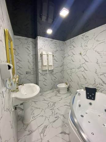 Imagen de la habitación del Hotel G'ayrat Hoji Ota. Foto 10