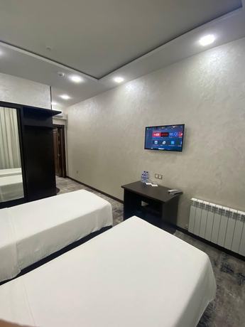 Imagen de la habitación del Hotel G'ayrat Hoji Ota. Foto 12