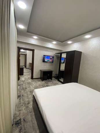 Imagen de la habitación del Hotel G'ayrat Hoji Ota. Foto 13