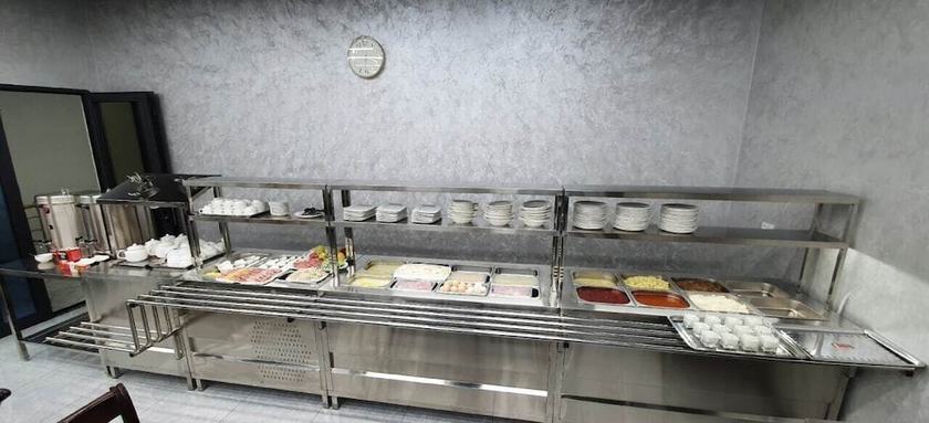 Imagen del bar/restaurante del Hotel G'ayrat Hoji Ota. Foto 5