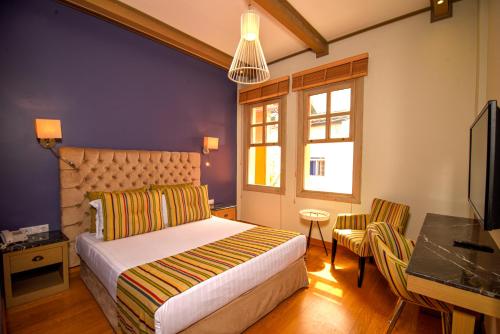 Imagen de la habitación del Hotel Gazetta Suites. Foto 16