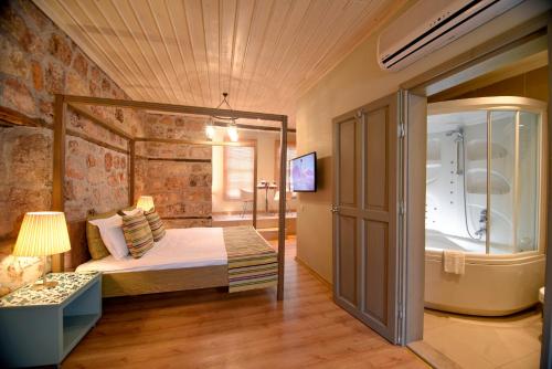 Imagen de la habitación del Hotel Gazetta Suites. Foto 18