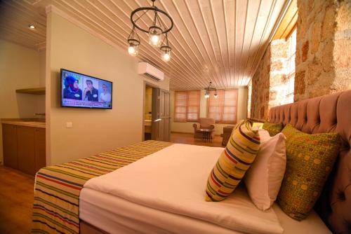 Imagen de la habitación del Hotel Gazetta Suites. Foto 19