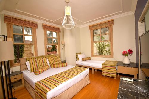 Imagen de la habitación del Hotel Gazetta Suites. Foto 20