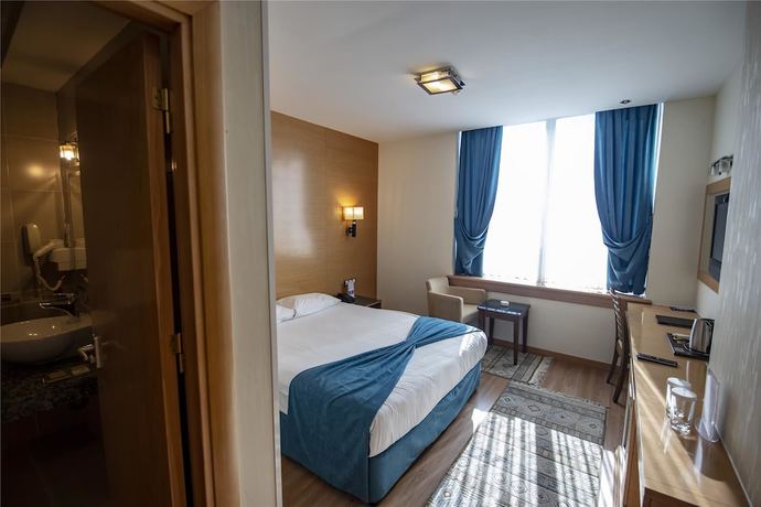 Imagen de la habitación del Hotel Gaziantep Plaza. Foto 6