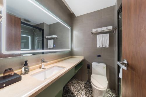 Imagen de la habitación del Hotel GeMei Luoyang Longmen High-speed Railway Station. Foto 17