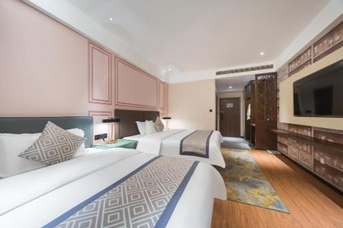 Imagen de la habitación del Hotel GeMei Luoyang Longmen High-speed Railway Station. Foto 18