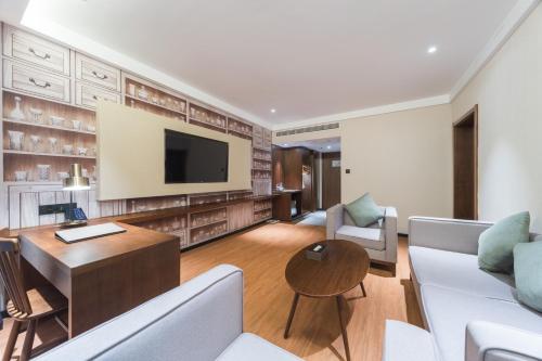 Imagen de la habitación del Hotel GeMei Luoyang Longmen High-speed Railway Station. Foto 19
