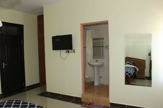 Imagen de la habitación del Hotel Gees Inn. Foto 12
