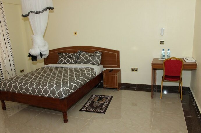 Imagen de la habitación del Hotel Gees Inn. Foto 13