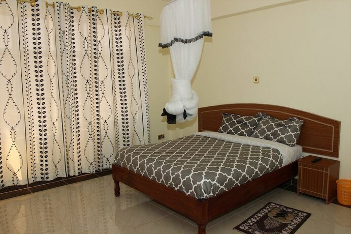 Imagen de la habitación del Hotel Gees Inn. Foto 14