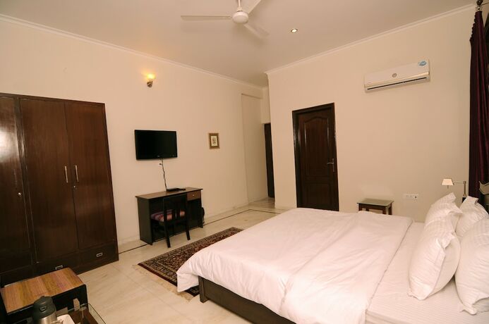 Imagen de la habitación del Hotel Geetanjali Luxury Suites. Foto 14