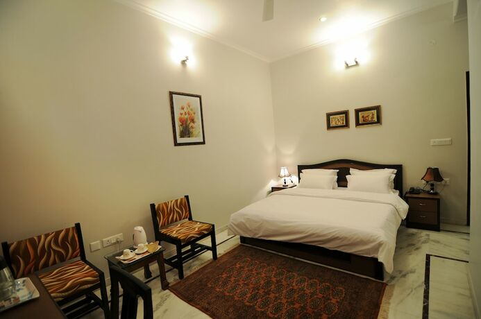 Imagen de la habitación del Hotel Geetanjali Luxury Suites. Foto 15