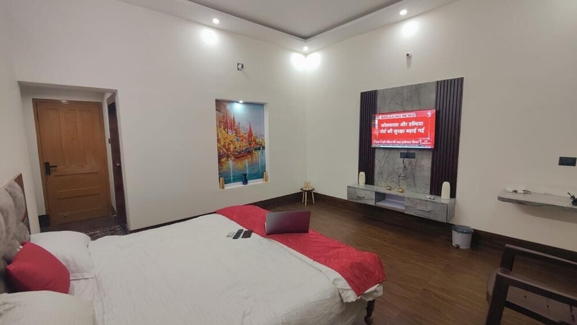 Imagen de la habitación del Hotel Geetatri Luxury Homestay. Foto 11