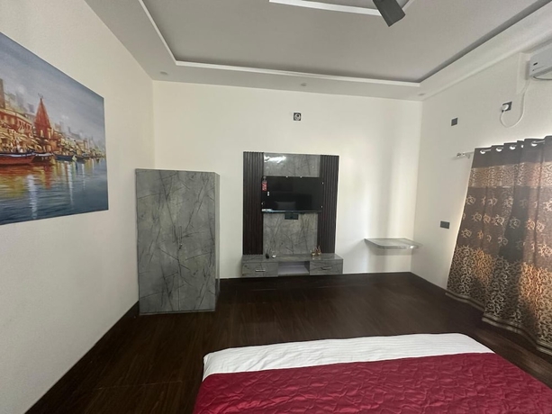 Imagen de la habitación del Hotel Geetatri Luxury Homestay. Foto 12