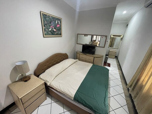 Imagen de la habitación del Hotel Gegerkalong Asri. Foto 17