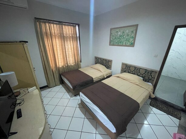 Imagen de la habitación del Hotel Gegerkalong Asri. Foto 20