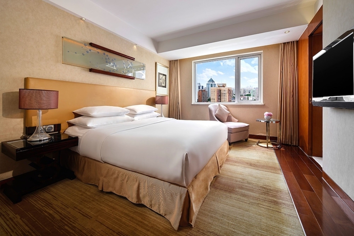 Imagen de la habitación del Hotel Gehua New Century. Foto 3