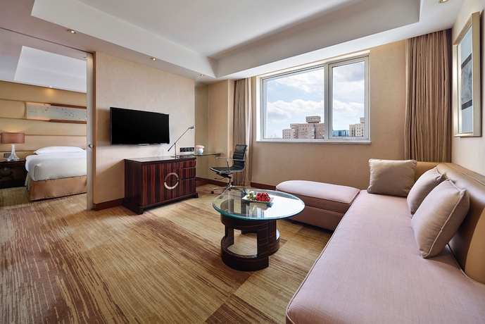 Imagen de la habitación del Hotel Gehua New Century. Foto 5