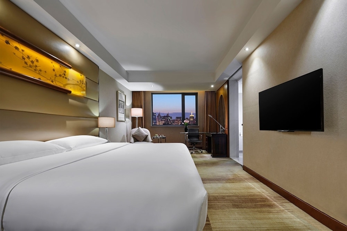 Imagen de la habitación del Hotel Gehua New Century. Foto 6