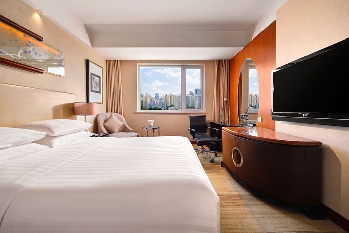 Imagen de la habitación del Hotel Gehua New Century. Foto 9