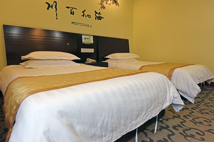 Imagen de la habitación del Hotel Geili Inn Huangshan. Foto 10