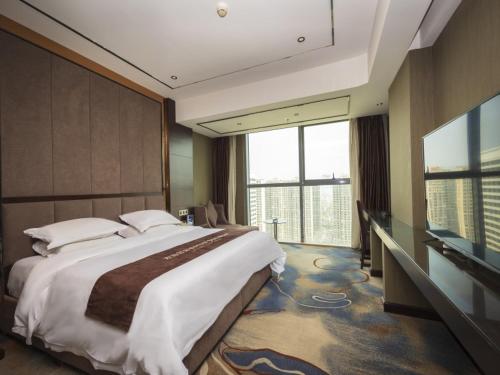Imagen de la habitación del Hotel Geli Bengbu Wanda Plaza Nanxiang City. Foto 15