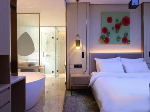 Imagen de la habitación del Hotel Geli Bengbu Wanda Plaza Nanxiang City. Foto 19