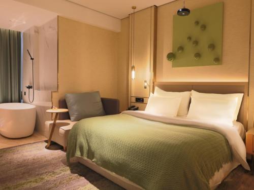 Imagen de la habitación del Hotel Geli Bengbu Wanda Plaza Nanxiang City. Foto 20