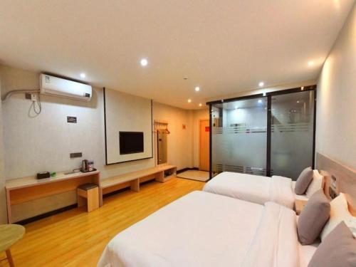 Imagen de la habitación del Hotel Geli Xuzhou Government Olympic Sports Center. Foto 16