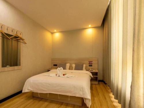 Imagen de la habitación del Hotel Geli Xuzhou Government Olympic Sports Center. Foto 17