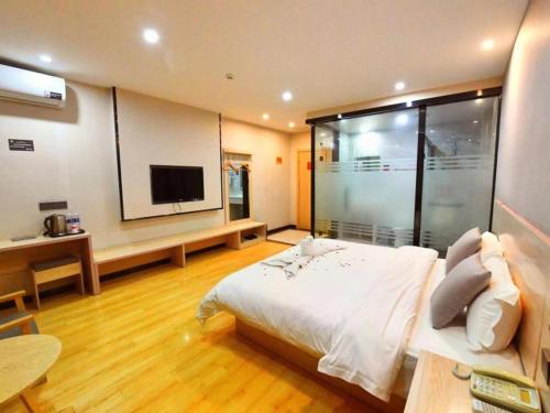 Imagen de la habitación del Hotel Geli Xuzhou Government Olympic Sports Center. Foto 18