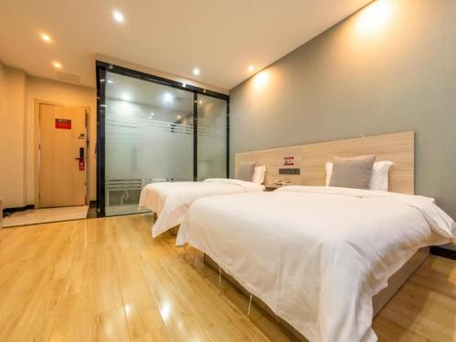 Imagen de la habitación del Hotel Geli Xuzhou Government Olympic Sports Center. Foto 19