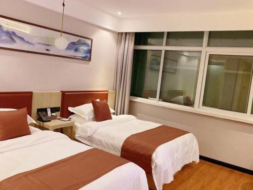 Imagen de la habitación del Hotel Geli Zaozhuang High-Speed Railway Station. Foto 12