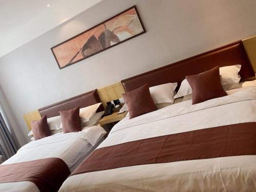 Imagen de la habitación del Hotel Geli Zaozhuang High-Speed Railway Station. Foto 15