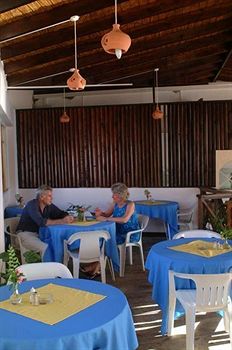 Imagen del bar/restaurante del Hotel Gem Holiday Beach Resort. Foto 4