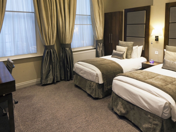 Imagen de la habitación del Hotel Gem Langham Court. Foto 6