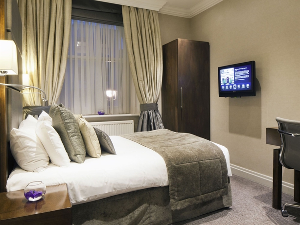 Imagen de la habitación del Hotel Gem Langham Court. Foto 8