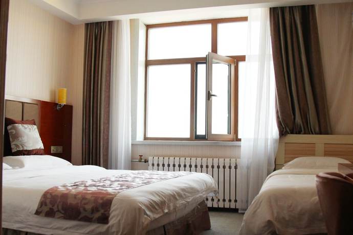 Imagen de la habitación del Hotel Gem Prairie Jia Sheng. Foto 14