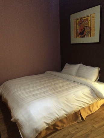 Imagen de la habitación del Hotel Geminai and Cafe. Foto 5