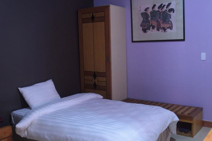 Imagen de la habitación del Hotel Geminai and Cafe. Foto 7